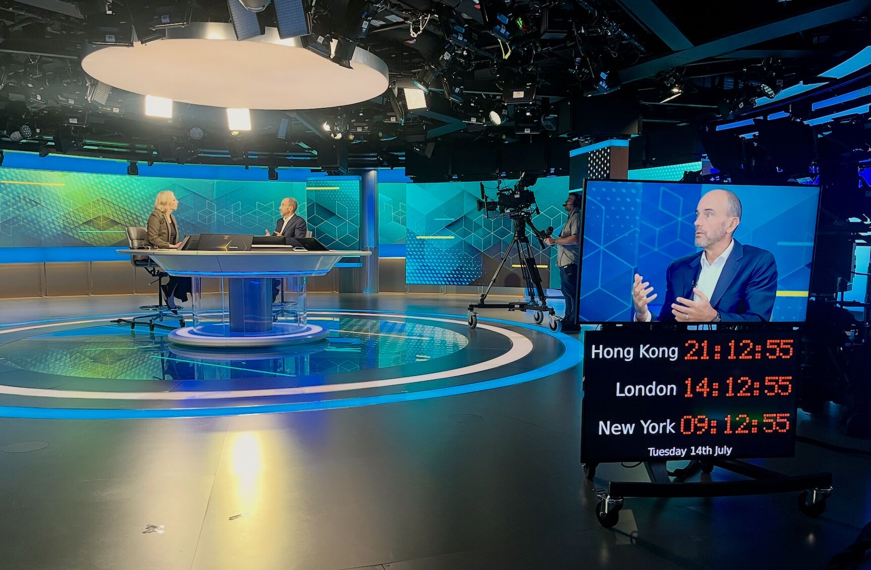 Bob Sternfels speaking during a television studio interview